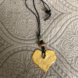 Heart necklace with mixed beads on a 14 inch leather cord.